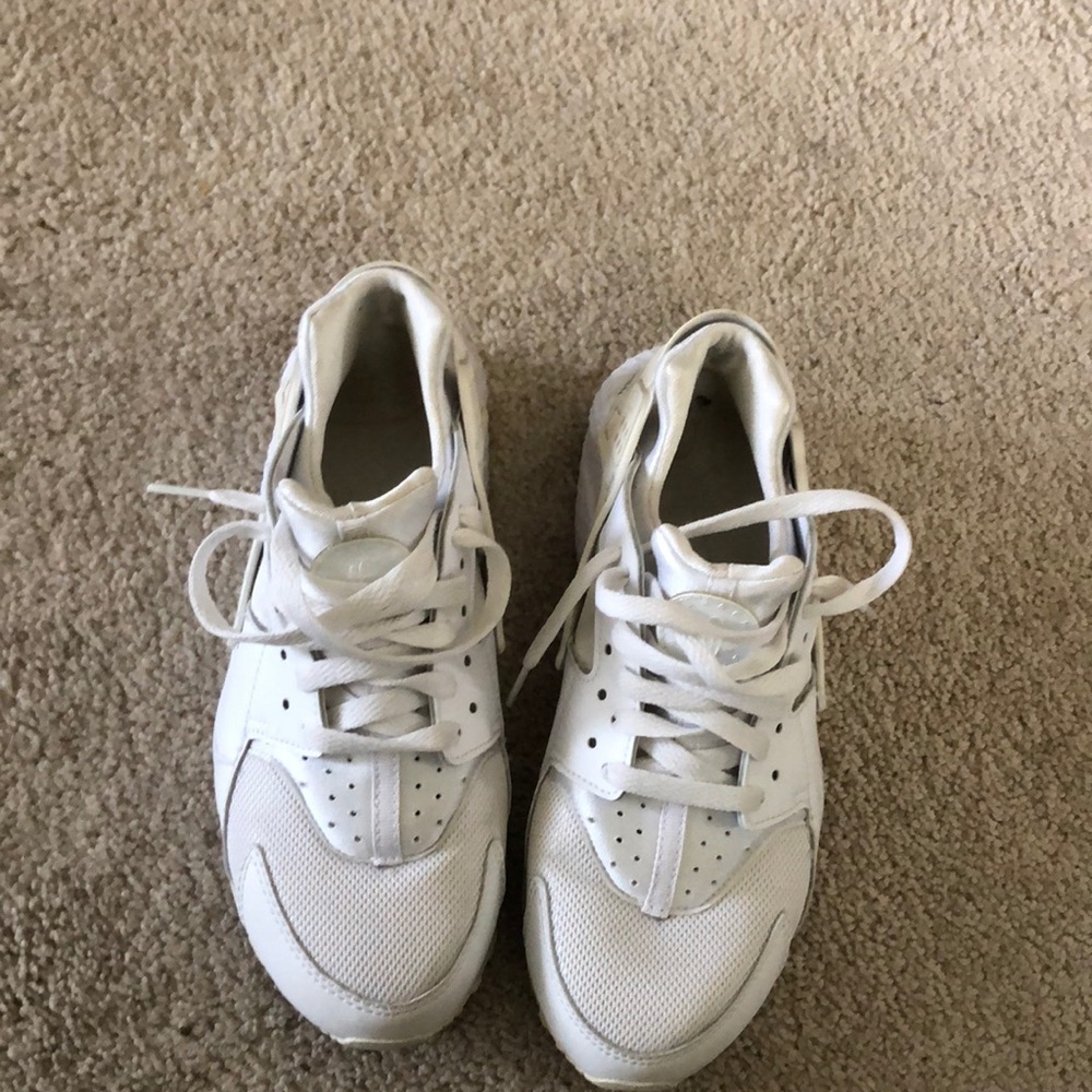 White Nike huarache with lots of wear left.